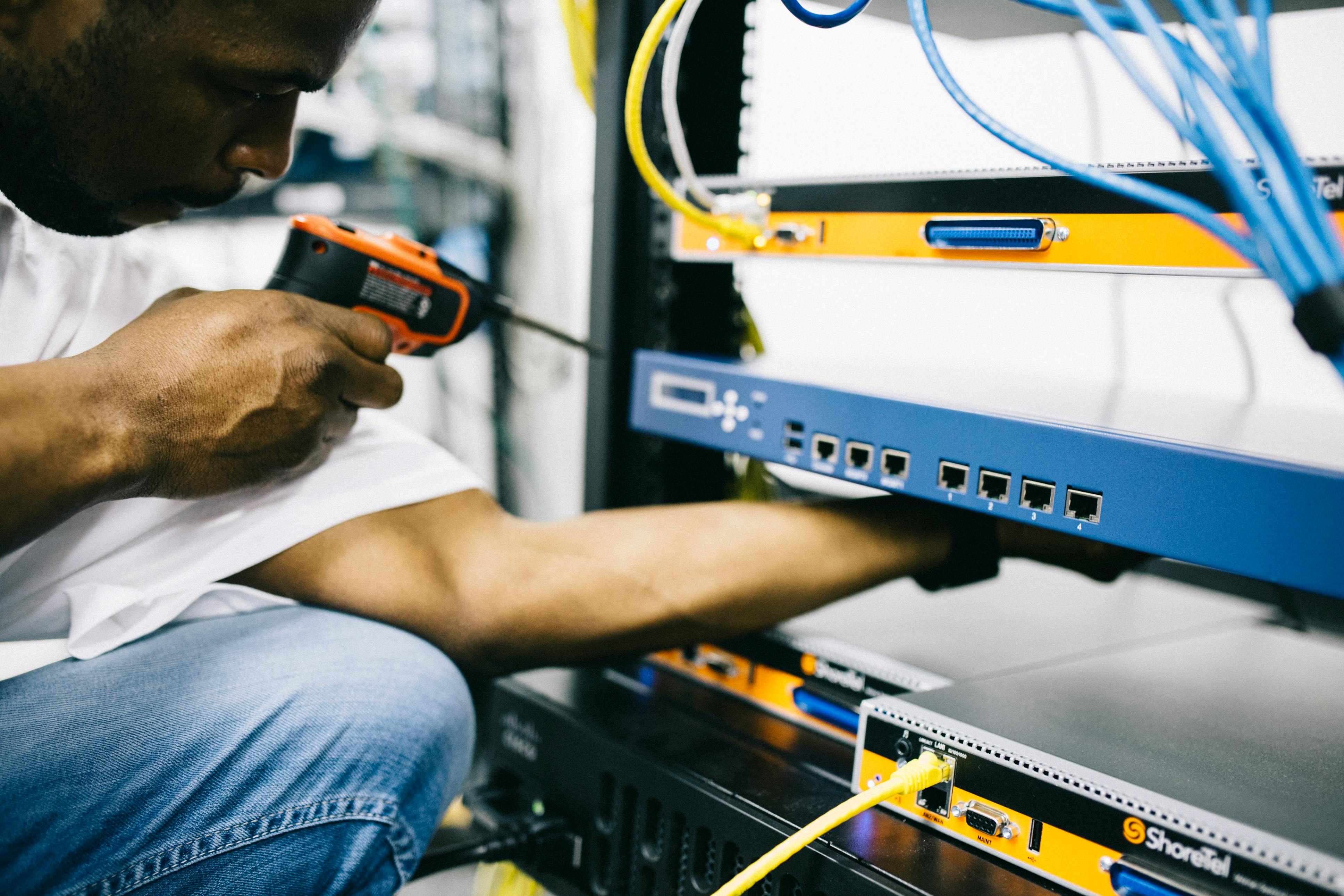 technician installing a router